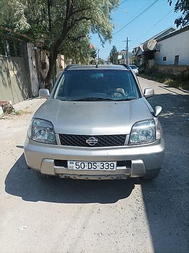 mtz 80 karopka: Nissan X‑Trail (T30) – gümüşü rəngli, 5 nəfərlik kompakt SUV Əsas — 1