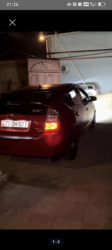 pirus 20 kuza: Toyota Prius hibrid, liftback (2-ci nəsil) - Rəng: tünd — 2