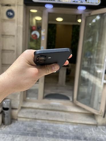iphone s16: IPhone 16, 128 GB, Black Titanium, Zəmanət, Simsiz şarj, Face ID — 7