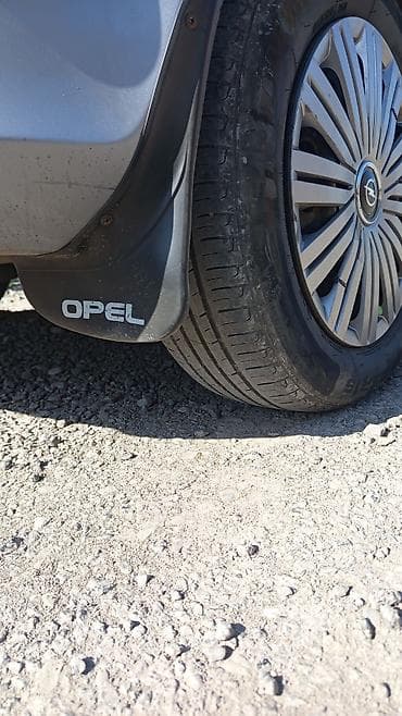 fort fujun buferi: Opel üçün orijinal təkər diskləri üçün dekorativ qalpaklar (hubcaps) — 3