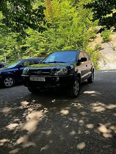 kia rio manitor: Hyundai Tucson: 2 l | 2005 il Ofrouder/SUV — 5