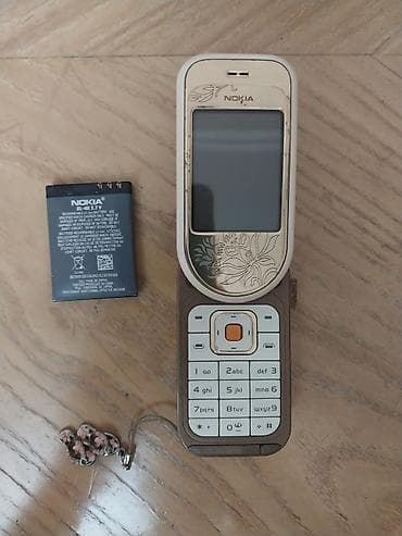 Мобильные телефоны и аксессуары: Nokia 7373, цвет - Золотой, Кнопочный — 2