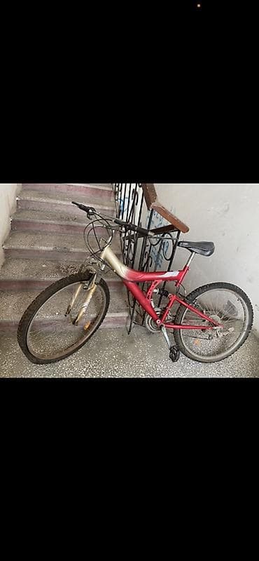 Şəhər velosipedləri: Ön və arxa asqılı, iki rəngli çərçivəyə malik dağ velosipedi. Qırmızı — 1