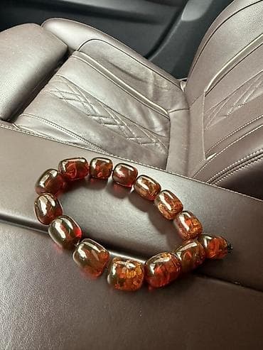 Zərgərlik əşyaları: Qəhvəyi-kəhrəba rəng çalarlarında böyük formalı muncuqlardan ibarət — 1