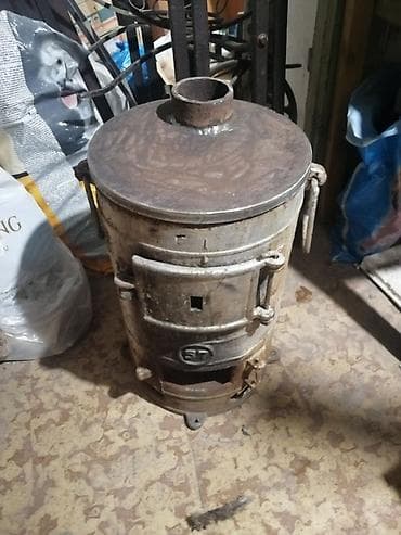 dəmir sac: Çuqun odun/kömür sobası – silindrik korpuslu, üstü qapaqlı və baca — 3