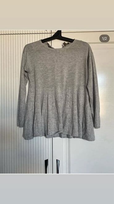 Açıq boz rəngdə uzunqol bluz. Yumşaq materialdan hazırlanıb, rahat və