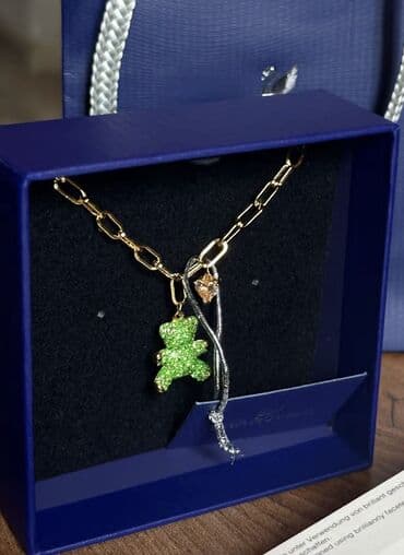 Daraq panellər: Zərgərlik dəsti iki reng svarovski qolbag original modeldi — 2