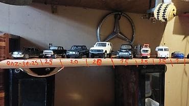 CD, DVD disklər və kassetlər: Məşq üçün model avtomobil – ağ rəngdə Lada Niva (miqyas təqribən — 4