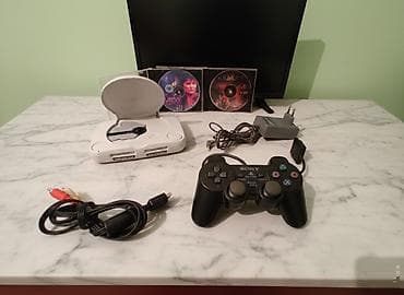 PlayStation One slim işlək vəziyyətdə iki ədəd oyun 1 ədəd pult var