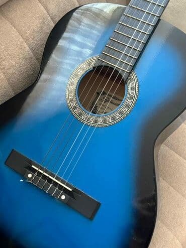 купить трюковой самокат в бишкеке: Gitara satilir Qiymet 130 man Unvan;Bakixanov mall Kod 5031 — 1