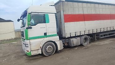 avtobuslar ve xususi texnikalar: MAN TGA 18.430 yük maşını və tentli yarımqoşqu dəst satılır — 4