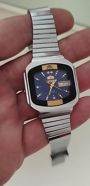 kurtqalar qiymətləri: Qol saatı, Orient, rəng - Gümüşü — 1