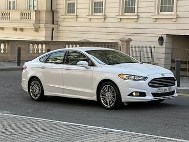 dinamo ford focus: Ford Fusion sedan – ağ rəng, 4 qapı, ön ötürücülü. Xüsusiyyətlər: - — 3