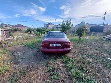 diffuser satisi: Hyundai Sonata: 2 l | 1997 il Sedan — 2