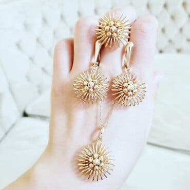 italyan qizili: Dəstə daxildir: Kulon, Üzük, Sırğa, Pandora, Sarı qızıl, 585 Əyar, 1583 g — 1