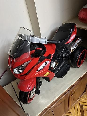 ucuz masinlar: Usag ucun elektrikli motoskilet. Qirmizi rengde hec bir prablemi yoxdu — 2