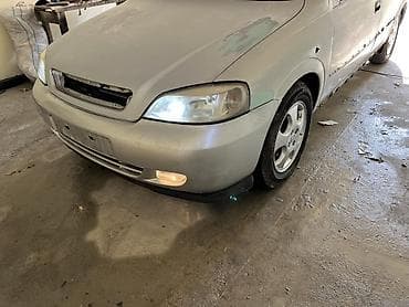 bmw e 39: Ön, Opel Astra G — 2