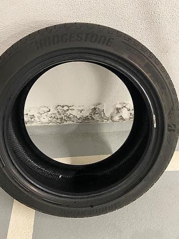 teker 18 type 0: İşlənmiş Şin Bridgestone 235 / R 18 — 4