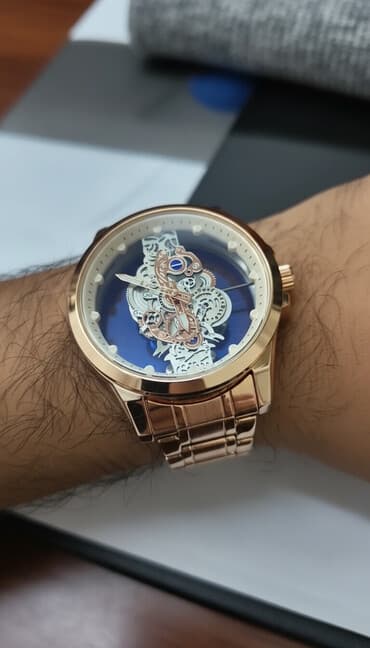 saat gumuş: Kişi qol saatı - Korpus və qolbaq: paslanmayan poladdan, qızılı rəng — 2