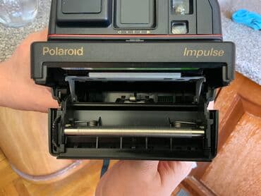 darsonval nedir: Polaroid 600 İmpulse- fotokamerası. İstehsalçı ölkə: United Kingdom. 1 — 6