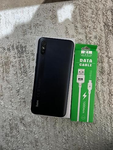 Аудиотехника: Redmi 9T, 64 ГБ, цвет - Черный, Отпечаток пальца — 4