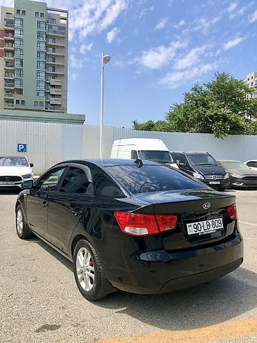 disk qabi: Kia Cerato: 1.6 l | 2011 il Sedan — 5