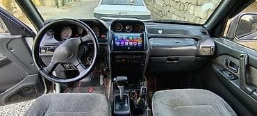 mitsubishi pickup: Mitsubishi Pajero, 1994 il - Kuzov: 5 qapılı SUV, ağ/gümüş rəng. - — 5