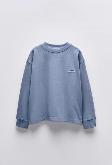 Manejlər: Zara 13-14 yaş Tərkib: - Oversize kəsimli svitşot – yuvarlaq yaxalı — 1