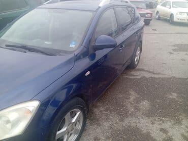 215 75 16 c: Kia cee’d SW (universal), tünd mavi rəng. - Kuzov: 5 qapılı — 9