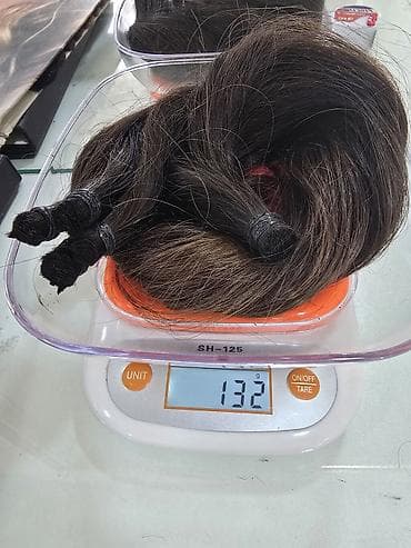 Tebii usaq saci rengsiz,boyasiz.uzunluq 45sm 132 qram — 2