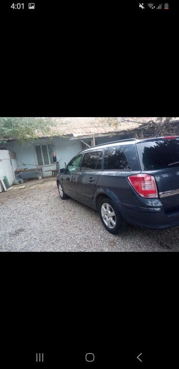 opel 1994: Opel Astra Caravan (universal kuzov) – tünd mavi rəng - Kuzov: 5 — 5