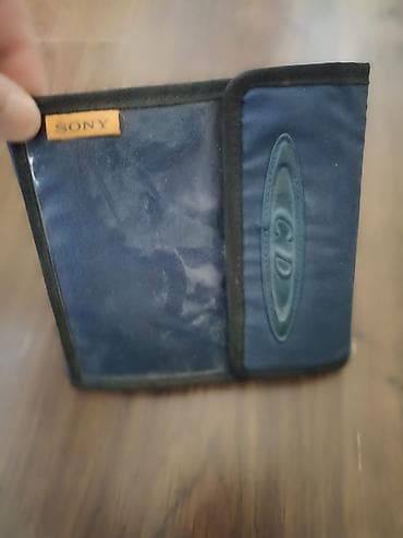 oyun diskleri magazasi: Sony CD/DVD disk qabı – yumşaq parça materialdan, qatlana bilən — 1