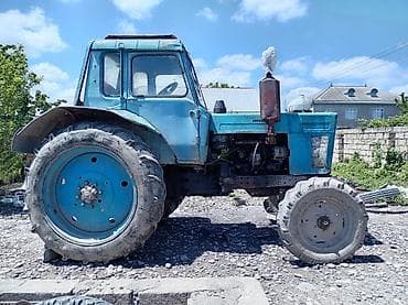 radiato: Traktor MTZ (Belarus) tipli, mavi rəngli, kabinəli. Texniki — 4