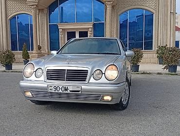 2000 bmw 320i: Mercedes-Benz E-Class: 2.4 l | 1999 il Sedan — 2