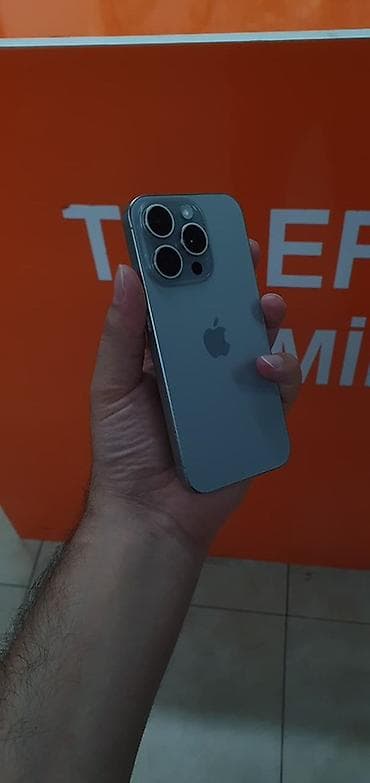 en ucuz apple macbook: IPhone 15 Pro, 128 GB, Natural Titanium, Face ID — 4