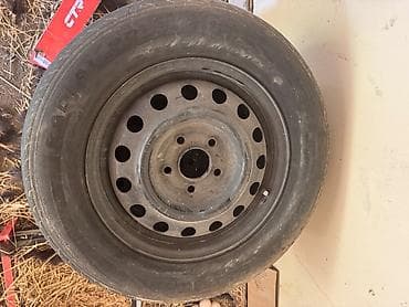 2 2 mator: Dəmir disklə birlikdə təkər - Ölçü: yan divarda “R15” işarəsi görünür — 1