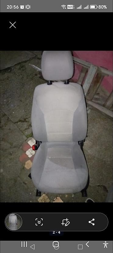 Avtomobil ön oturacağı - Boz rəngli parça üzlüklü, başaltılıqla