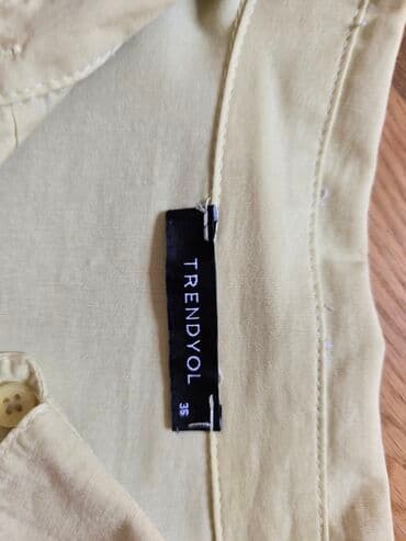 qadın köynək modelləri: TRENDYOL markasının qadınlar üçün nəzərdə tutulmuş açıq sarı rəngli — 3