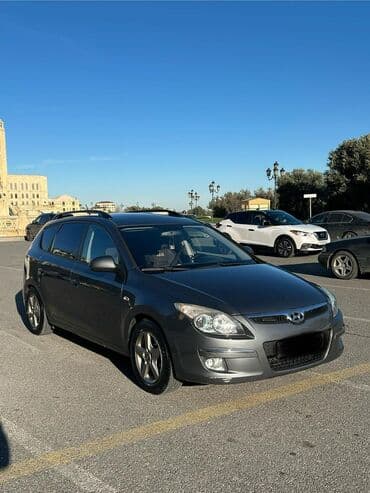 фольксваген тигуан 2 0: Hyundai i30 CW (universal) – tünd boz rəngdə, şəhərdaxili və ailə — 2