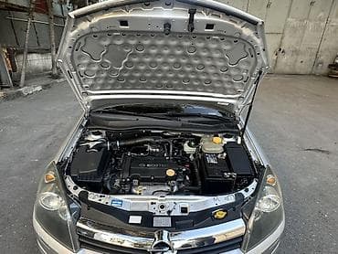 opel astra k: Opel Astra H Caravan (universal), gümüşü rəng. - Kuzov: 5 qapılı — 10