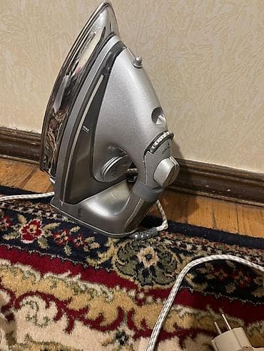 ütü: Saachi Steam Iron buxarlı ütü.hec bir problemi yoxdu.cox yaxşı — 4