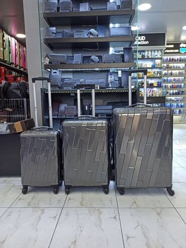 yol cantası: Material polikarbonat.S-50azn. M-80azn. L-110azn Camadan — 1