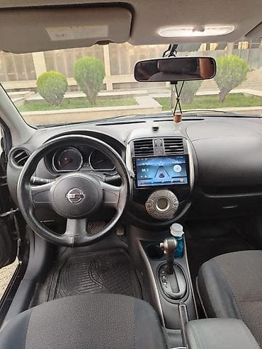 tesla model s: Nissan Sunny: 1.3 l | 2012 il Sedan — 9