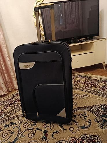 islenmis camadan: Sərnişin çamadanı – təkərli, dartma qulplu Uzunluq 70 sm en 45 sm iç — 1