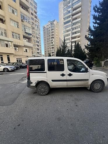 fiad doblo: Fiat Doblo (ağ rəng) – praktik və funksional miniven Xüsusiyyətlər: - — 8