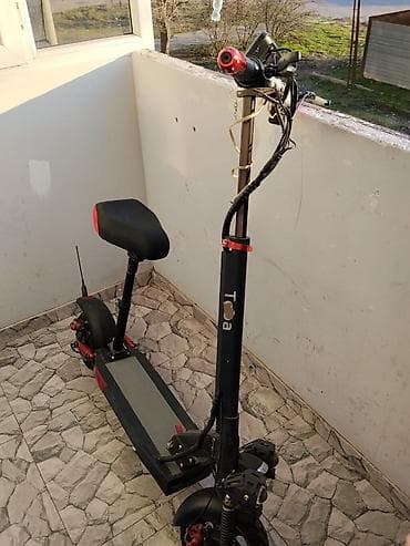 електро велосипед: Elektrikli skuter – güclü ikili amortizasiya və iri təkərlər — 2