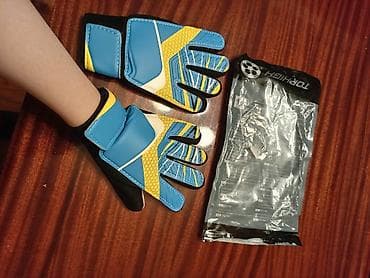 İdman çantaları: Rus dili: Вратарские перчатки для ребёнка до 12 лет. Синие а сзади — 2