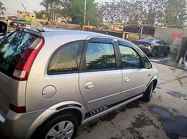 jeep fara: Opel Meriva, gümüşü rəng, 5 qapı, şəhər və ailə istifadəsi üçün rahat — 2