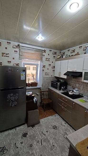 berde ev: Lokbatan qesbesi 233 sayli mektebin qabaginda 5 mertebeli evin 3 cu — 4