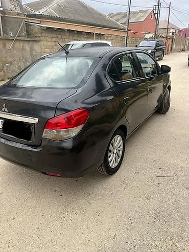 yan guzguler: Mitsubishi Attrage / Mirage G4 sedan - Rəng: qara - Kuzov: 4 qapılı — 8